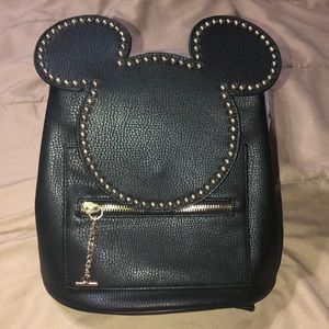 Mickey Mouse purse backpack.